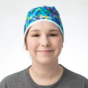 Rainbow pixel style print scrub cap that covers the whole head. Ideal for short but if hair is worn braided and pinned up can work for long hair too. Y2K, Medical surgical research Analyst, Ombre rainbow, Clinical Trial Tech, Surgical Study resident