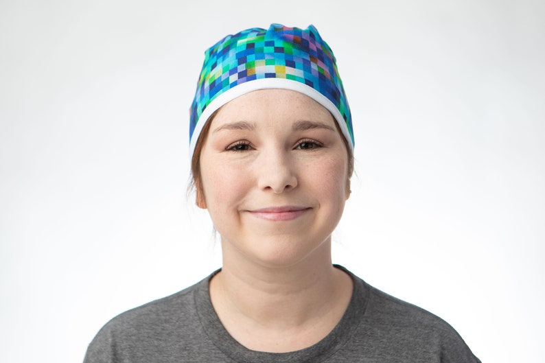 Rainbow pixel style print scrub cap that covers the whole head. Ideal for short but if hair is worn braided and pinned up can work for long hair too. Y2K, Medical surgical research Analyst, Ombre rainbow, Clinical Trial Tech, Surgical Study resident