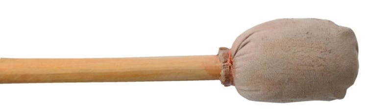 May include: A percussion mallet featuring a light brown wooden shaft and a rounded, beige head. The head is made of a soft, padded material, attached to the shaft with a reddish-brown binding. This mallet is designed for use with percussion instruments.