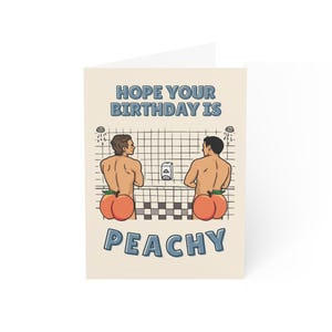 May include: A birthday greeting card with the text "HOPE YOUR BIRTHDAY IS PEACHY". The card features an illustration of two men with peach-shaped bottoms in a shower setting.