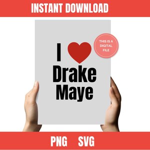 May include: A light gray sign held by hands, featuring the text "I Drake Maye" with a red heart. The sign also includes the text "THIS IS A DIGITAL FILE" in a pink circle, and the words "INSTANT DOWNLOAD" and "PNG SVG" in red.