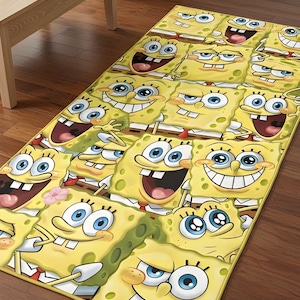 May include: A rectangular yellow rug featuring a repeating pattern of SpongeBob SquarePants' face. The rug is placed on a hardwood floor, with a light-colored chair and table in the background. The rug's design includes SpongeBob's smiling face.