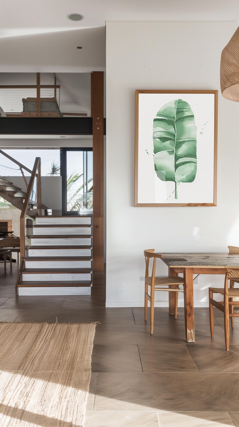 Watercolor banana leaf art print with lush green tones, perfect for tropical and botanical wall decor. Minimalist design captures nature-inspired style, adding a refreshing vibe to modern, bohemian, or office spaces. Unframed, ready to be styled