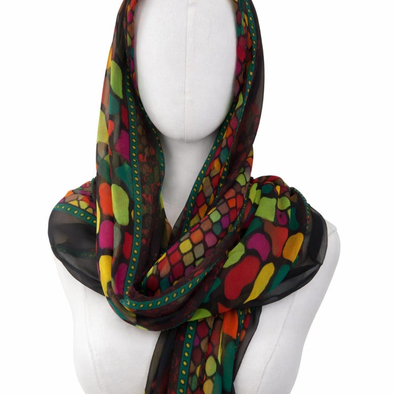 Woman wearing a vibrant statement scarf