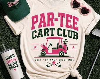 May include: A cream-colored t-shirt featuring the text PAR-TEE CART CLUB in pink and green, with a pink golf cart graphic, the text GOLF DRINKS GOOD TIMES, and two crossed golf clubs. A dark green baseball cap with the word Birdie Club is included.