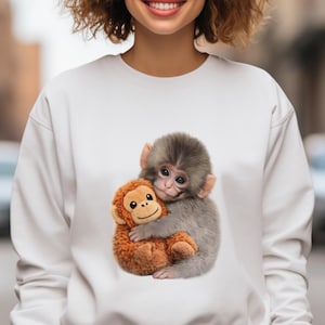 Apa med kramar och plyschleksak, mysig djurälskare - tröja