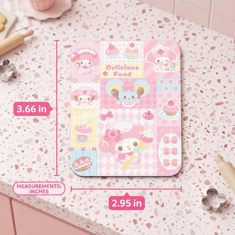 May include: A pink rectangular decorative item with a cartoon design, measuring 3.66 inches by 2.95 inches. The design includes cartoon characters, cupcakes, bows, and the text "Delicious Food". The item has a pink and white color scheme.