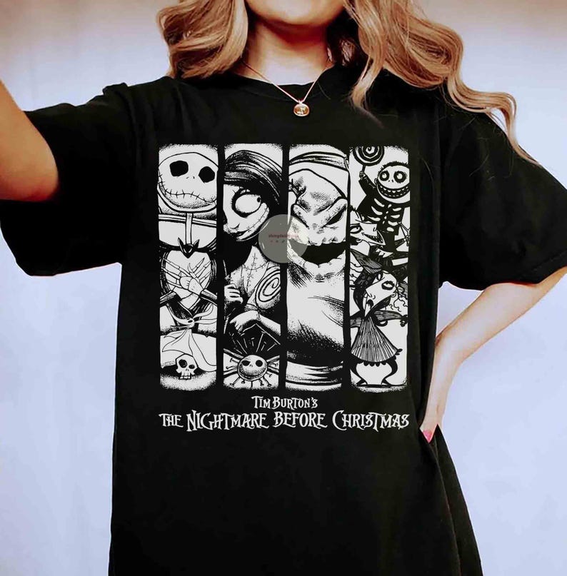 May include: Black t-shirt with a graphic from Tim Burton's "The Nightmare Before Christmas." The design features Jack Skellington, Sally, Oogie Boogie, and other characters in vertical panels. The film's title is printed below the characters.