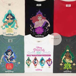 May include: Six t-shirts featuring Disney Princess graphics. The shirts are cream, black, red, sage green, white, and charcoal gray. Each shirt displays character illustrations, the text Disney Princess, runDisney, and the year 2027.