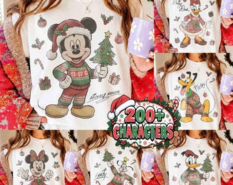 May include: A white t-shirt featuring a graphic print of Mickey Mouse wearing a Christmas sweater and hat while holding a tree. The design includes holiday ornaments, holly, and gifts. The text Mickey Mouse is printed below the character.