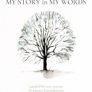 May include: A journal cover with the text "MY STORY in MY WORDS" above a watercolor illustration of a tree. The tree has a dark brown trunk and branches, with a light gray and white canopy. Below the tree is the text "a guided life story journal for parents & grandparents."