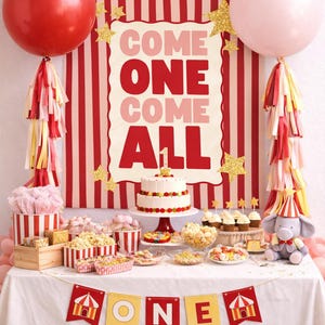 May include: A festive circus-themed party setup with a red and white striped backdrop. The scene includes a cake, cupcakes, popcorn, and a banner that reads "COME ONE COME ALL". Red and pink balloons and a stuffed elephant complete the celebratory atmosphere.