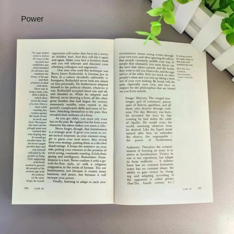 May include: An open book with text on a white background. The word "Power" is at the top. The text discusses strategy, formlessness, and adapting to circumstances. Page numbers 194 and 195 are visible.