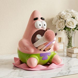 May include: A set of three ceramic canisters with lids. The canisters are white with a blue floral pattern. The largest canister is 8 inches tall, the medium is 6 inches, and the smallest is 4 inches.