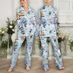 May include: A white ceramic mug with a black handle and the text "But First, Coffee" in a handwritten style. The mug is on a white surface. The mug is 4 inches tall.