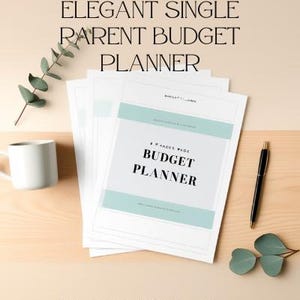 May include: A budget planner with the text "ELEGANT SINGLE PARENT BUDGET PLANNER" and "BUDGET PLANNER" in black font. The planner has a light blue stripe and is next to a pen, a white mug, and eucalyptus leaves. The text "8-Page Printable PDF for Your Finances" is at the bottom.