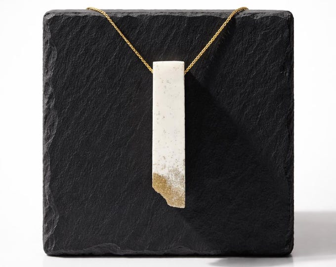 Featured listing image: Minimalist gold necklace with rectangular pendant in white with gold accents – model “Gylden”