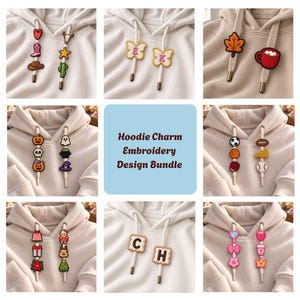 May include: A collection of hoodie charm embroidery designs displayed on beige hooded sweatshirts. The charms feature various icons including western motifs, butterflies with letters, seasonal symbols, sports equipment, holiday items, and floral shapes.