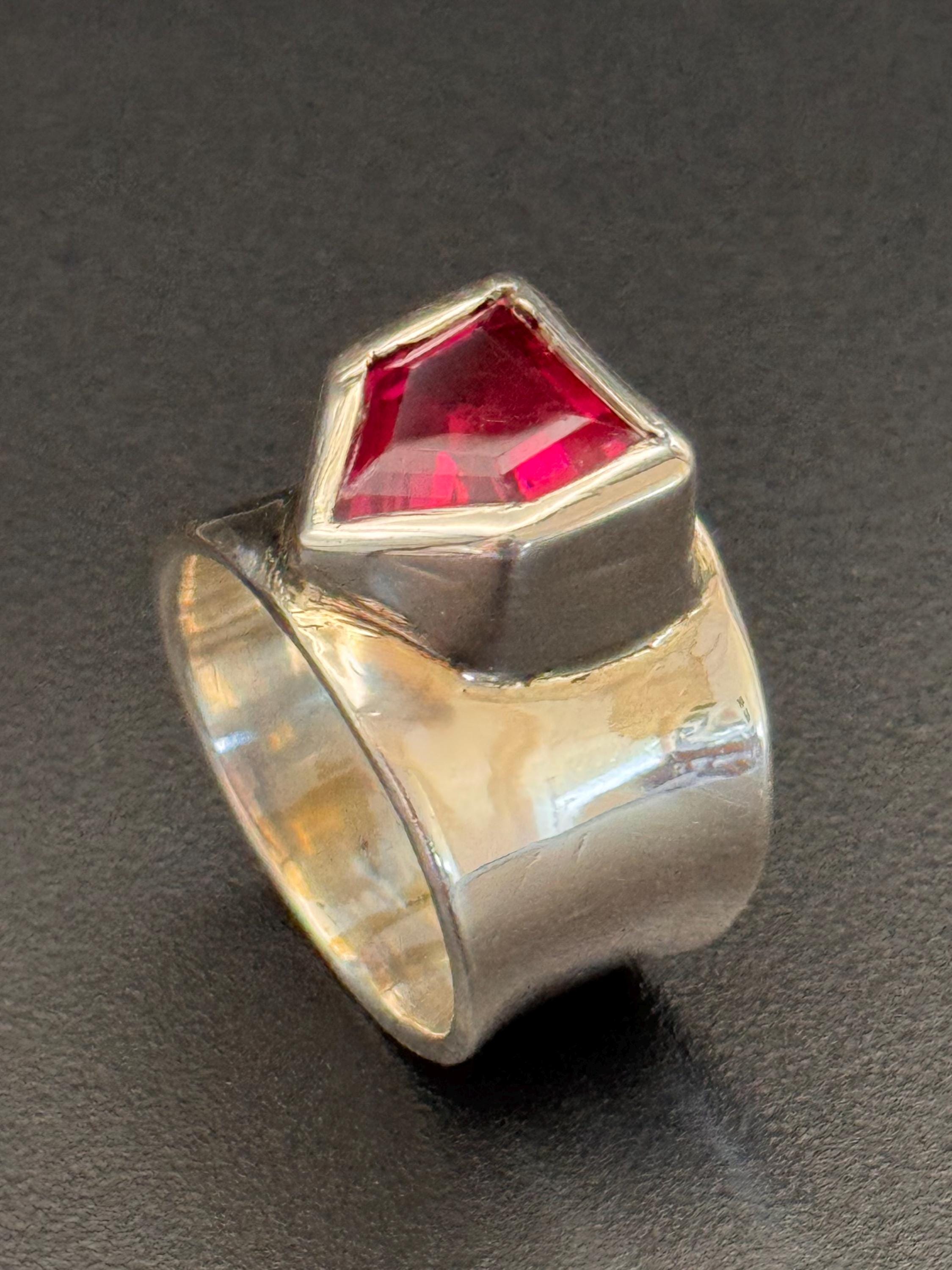 Silver and Ruby Direction Ring