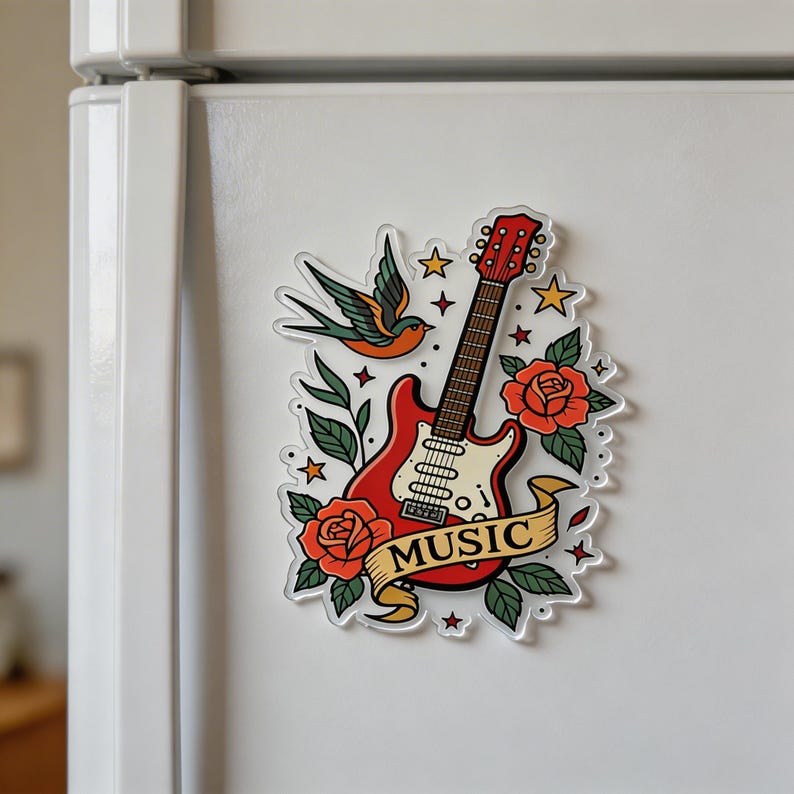 May include: A red electric guitar sticker with a banner that reads "MUSIC". The sticker features a traditional tattoo design with roses, stars, a swallow, and green leaves. The guitar has a white pickguard.