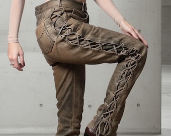 Beige lace up leather motorcycle pants with rugged patina in biker style