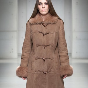 vintage brown sheepskin coat with shearling fur collar and hems