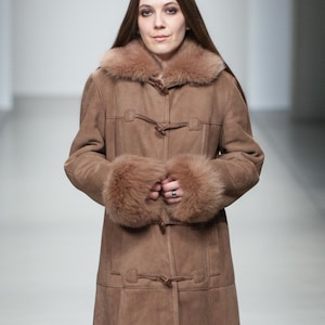 vintage brown sheepskin coat with shearling fur collar and hems