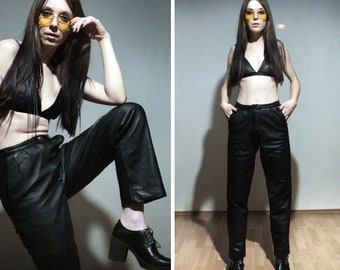 1980s Leather pants / High waisted tapered leather trousers