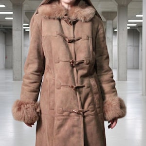 vintage brown sheepskin coat with shearling fur collar and hems