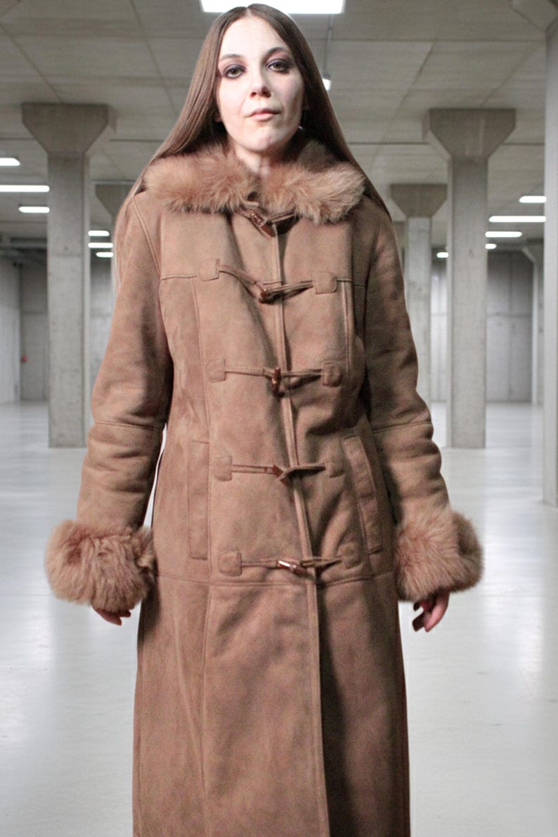 vintage brown sheepskin coat with shearling fur collar and hems