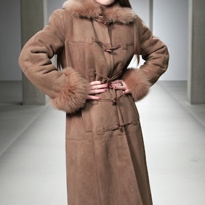 vintage brown sheepskin coat with shearling fur collar and hems