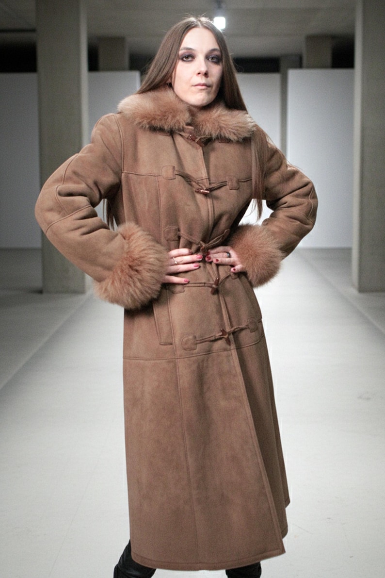 vintage brown sheepskin coat with shearling fur collar and hems