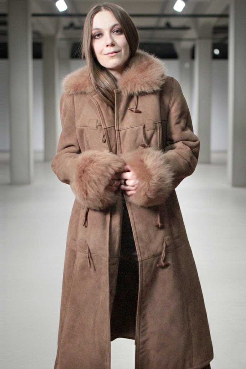 vintage brown sheepskin coat with shearling fur collar and hems