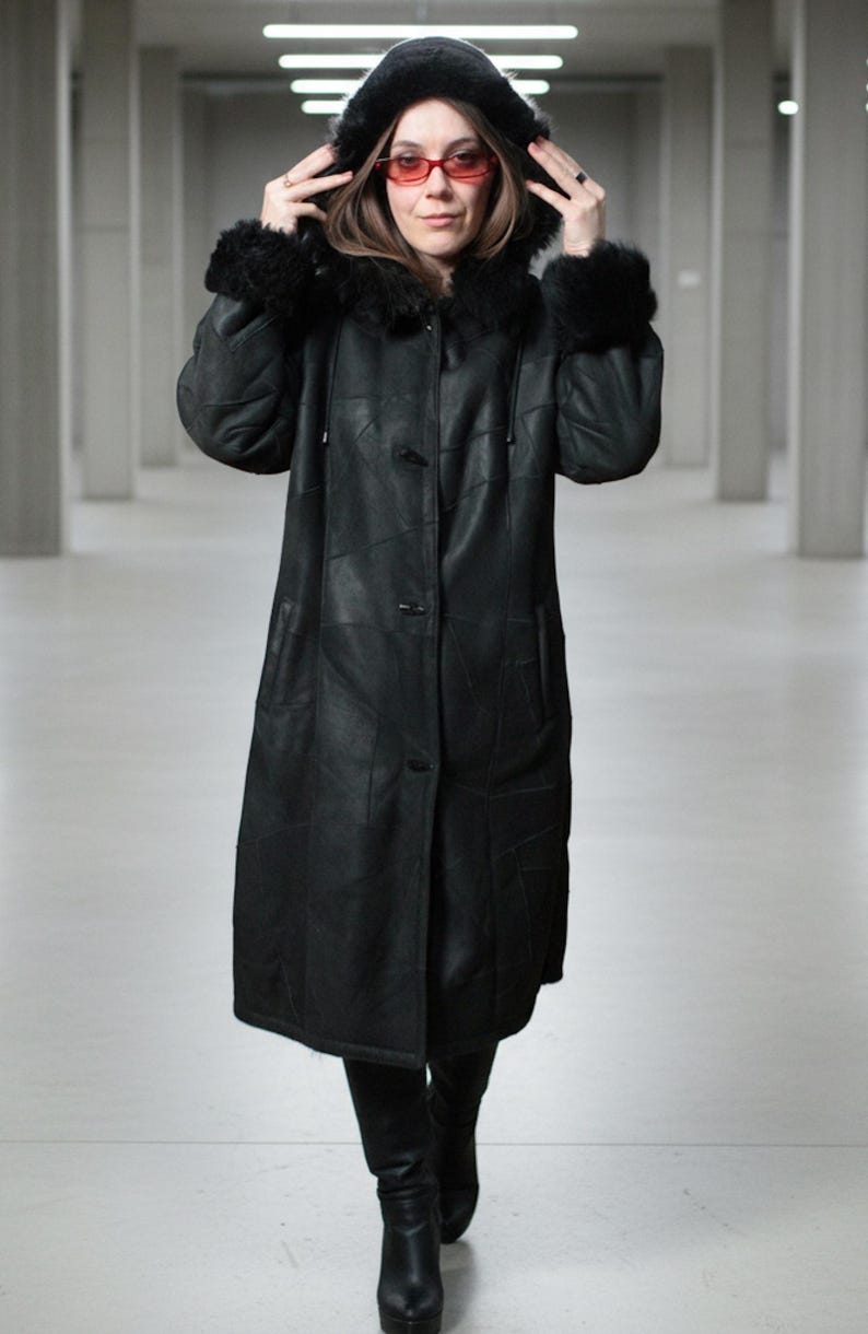 Hooded black shearling sheepskin coat with fur interior