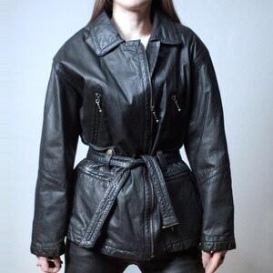 Vintage black leather jacket with a belt