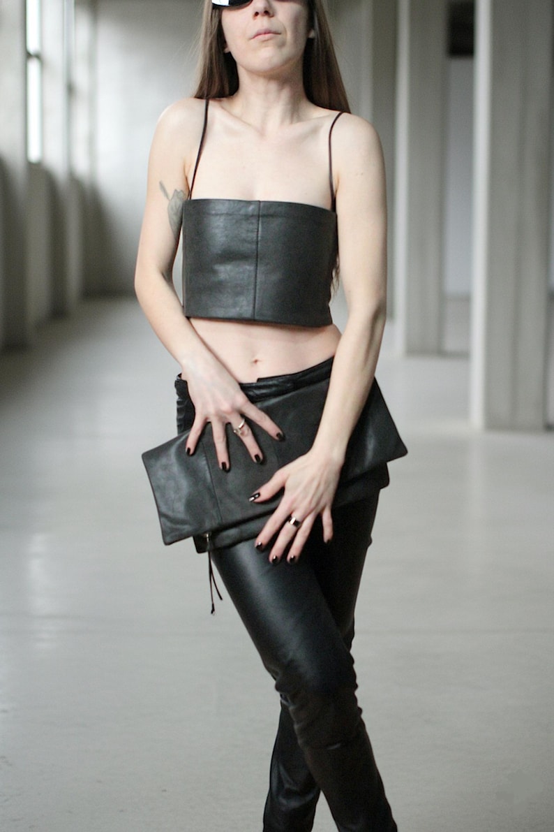 Large fold-over leather clutch bag with burgundy red interior
