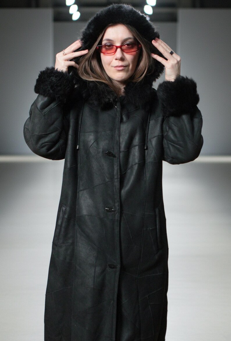 Hooded black shearling sheepskin coat with fur interior