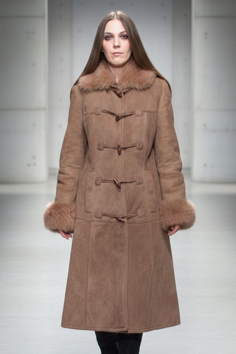 vintage brown sheepskin coat with shearling fur collar and hems