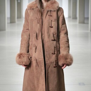vintage brown sheepskin coat with shearling fur collar and hems