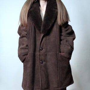 mens brown sheepskin coat with large collar and beige shearling interior