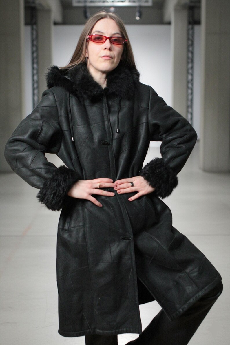 Hooded black shearling sheepskin coat with fur interior