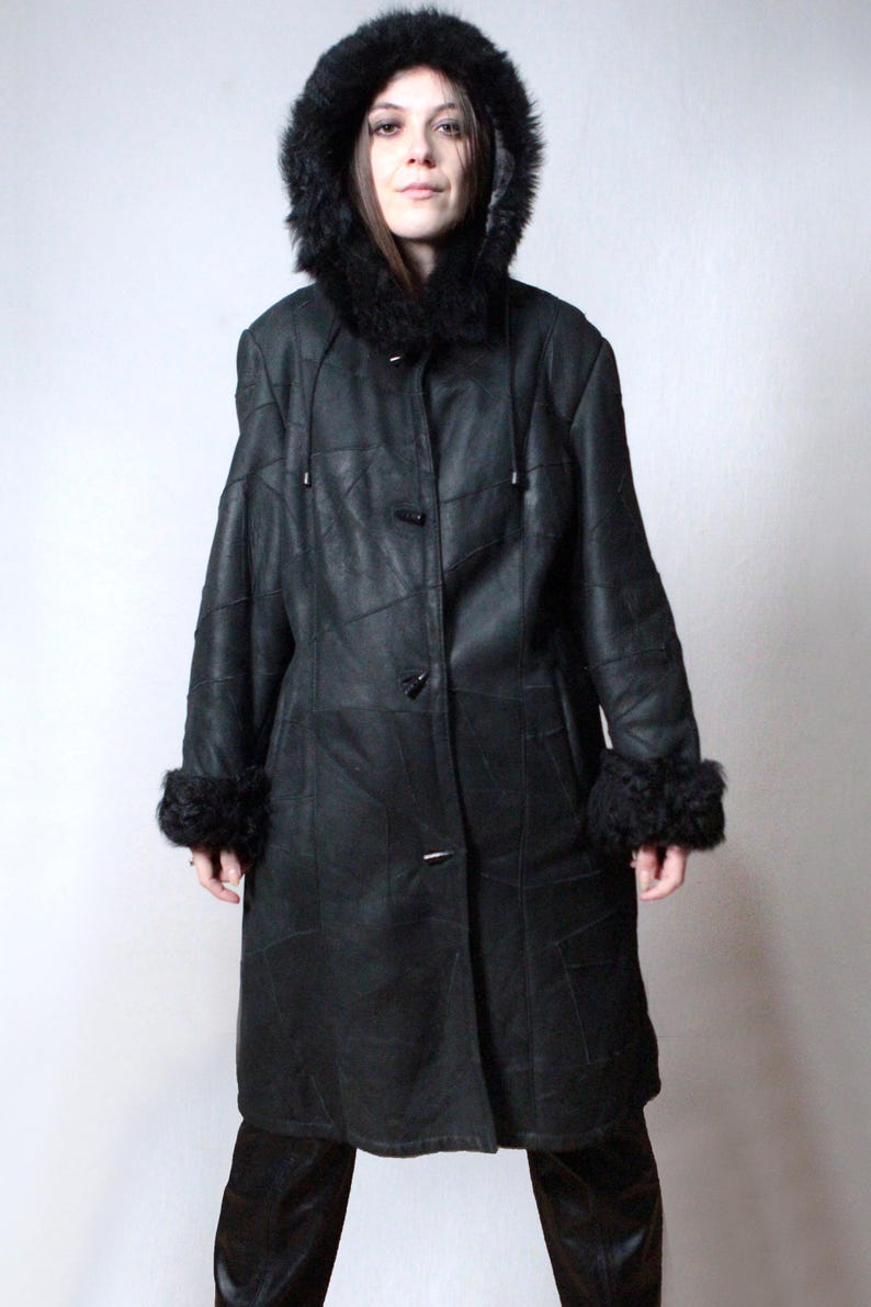 black patchwork sheepskin coat with black fur shearling