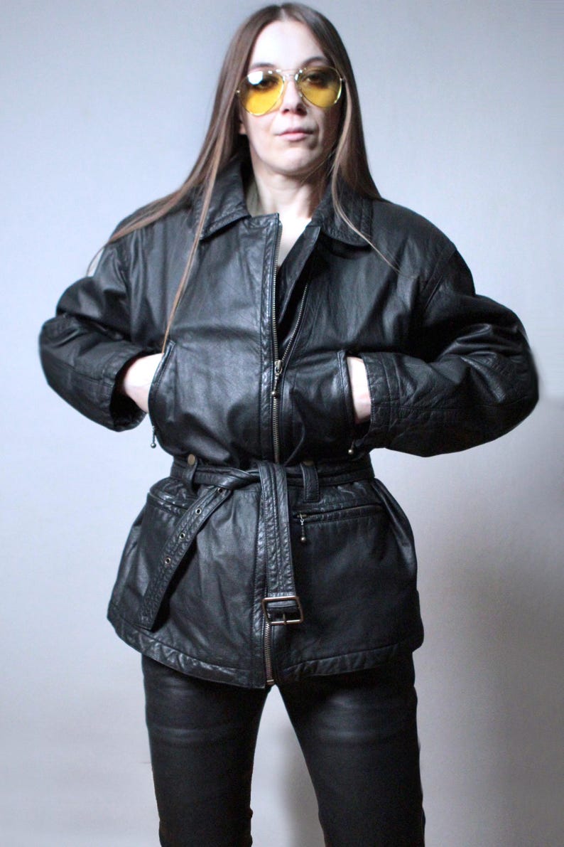 Vintage black leather jacket with a belt