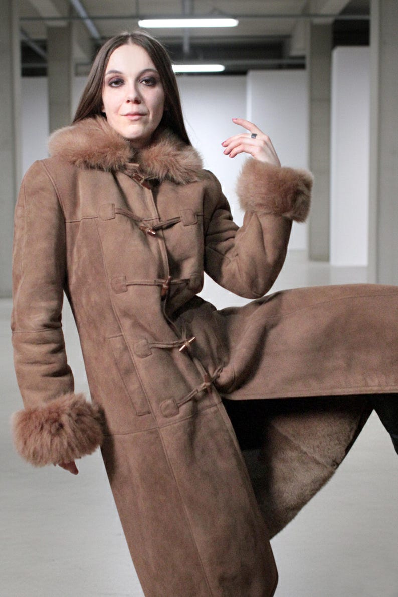 vintage brown sheepskin coat with shearling fur collar and hems