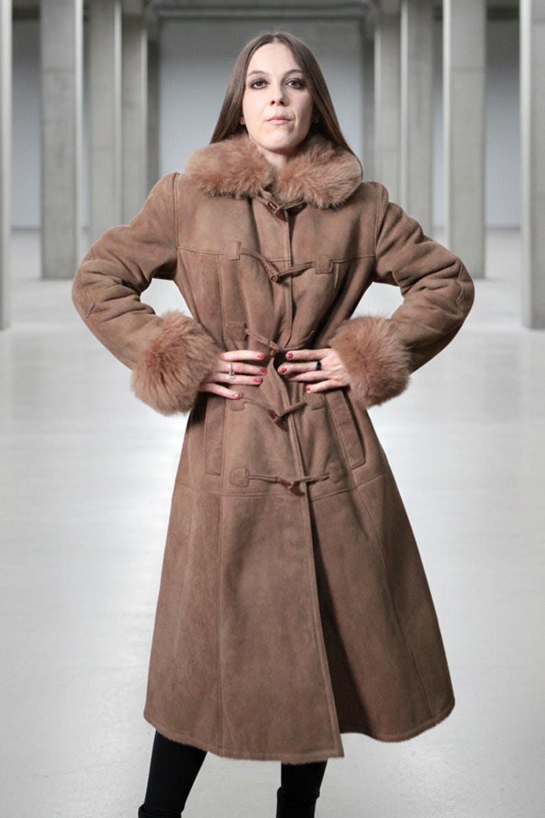 vintage brown sheepskin coat with shearling fur collar and hems