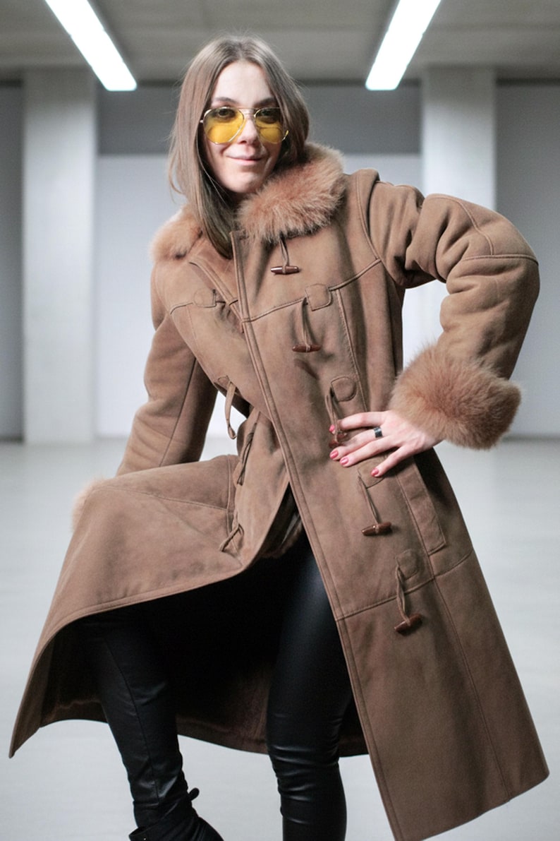 vintage brown sheepskin coat with shearling fur collar and hems