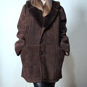 mens brown sheepskin coat with large collar and beige shearling interior