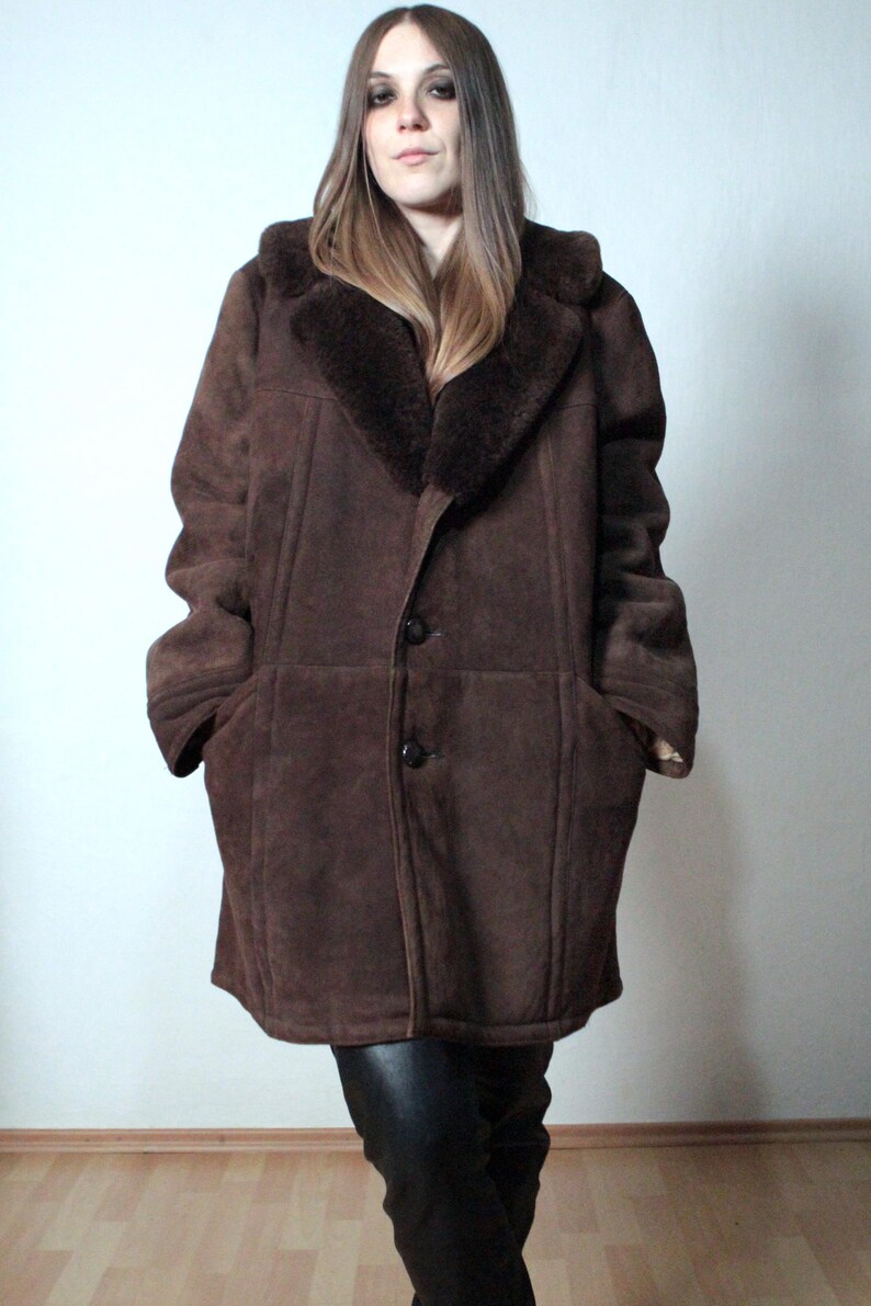 mens brown sheepskin coat with large collar and beige shearling interior