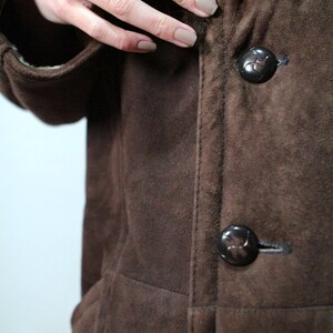 mens brown sheepskin coat with large collar and beige shearling interior