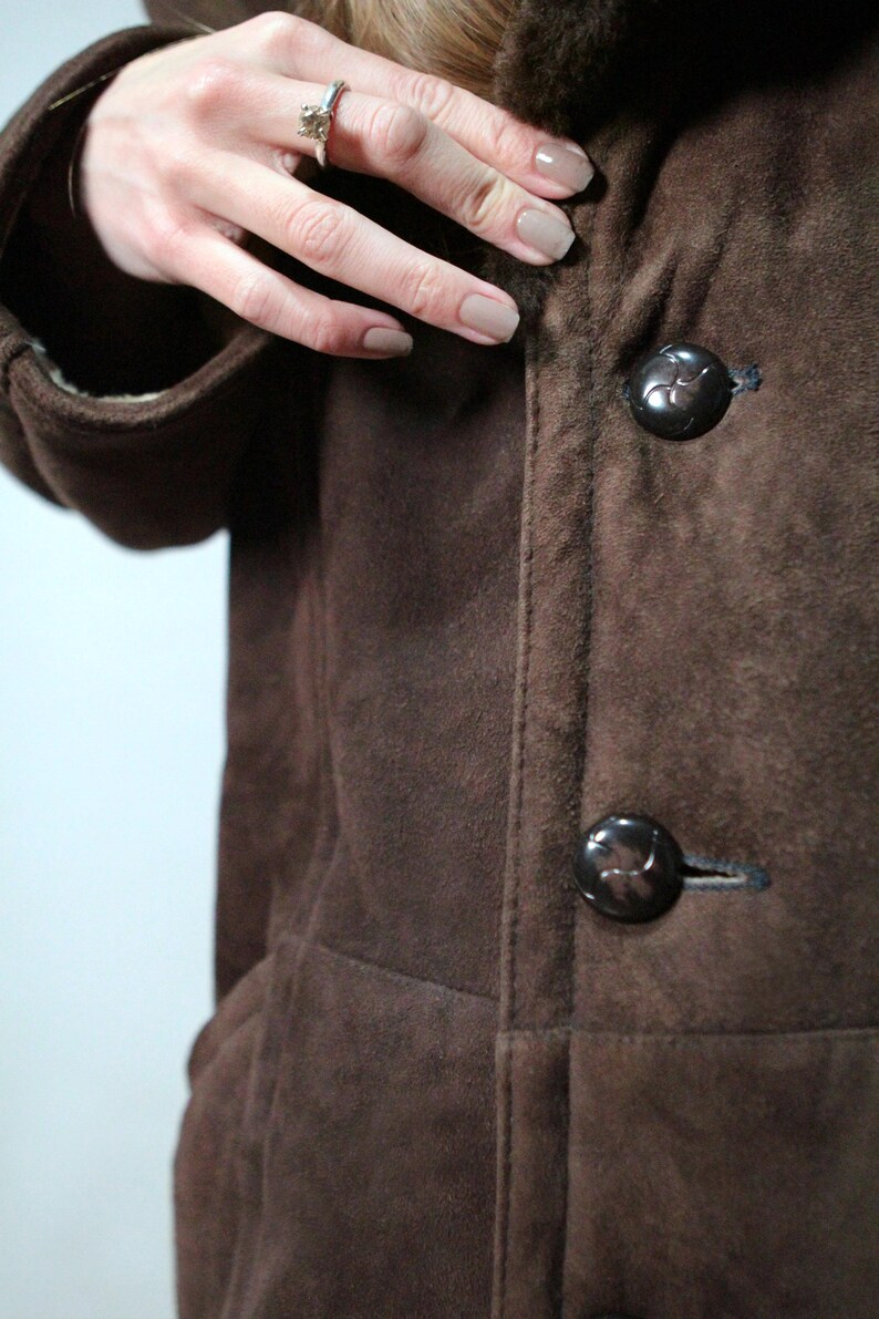mens brown sheepskin coat with large collar and beige shearling interior
